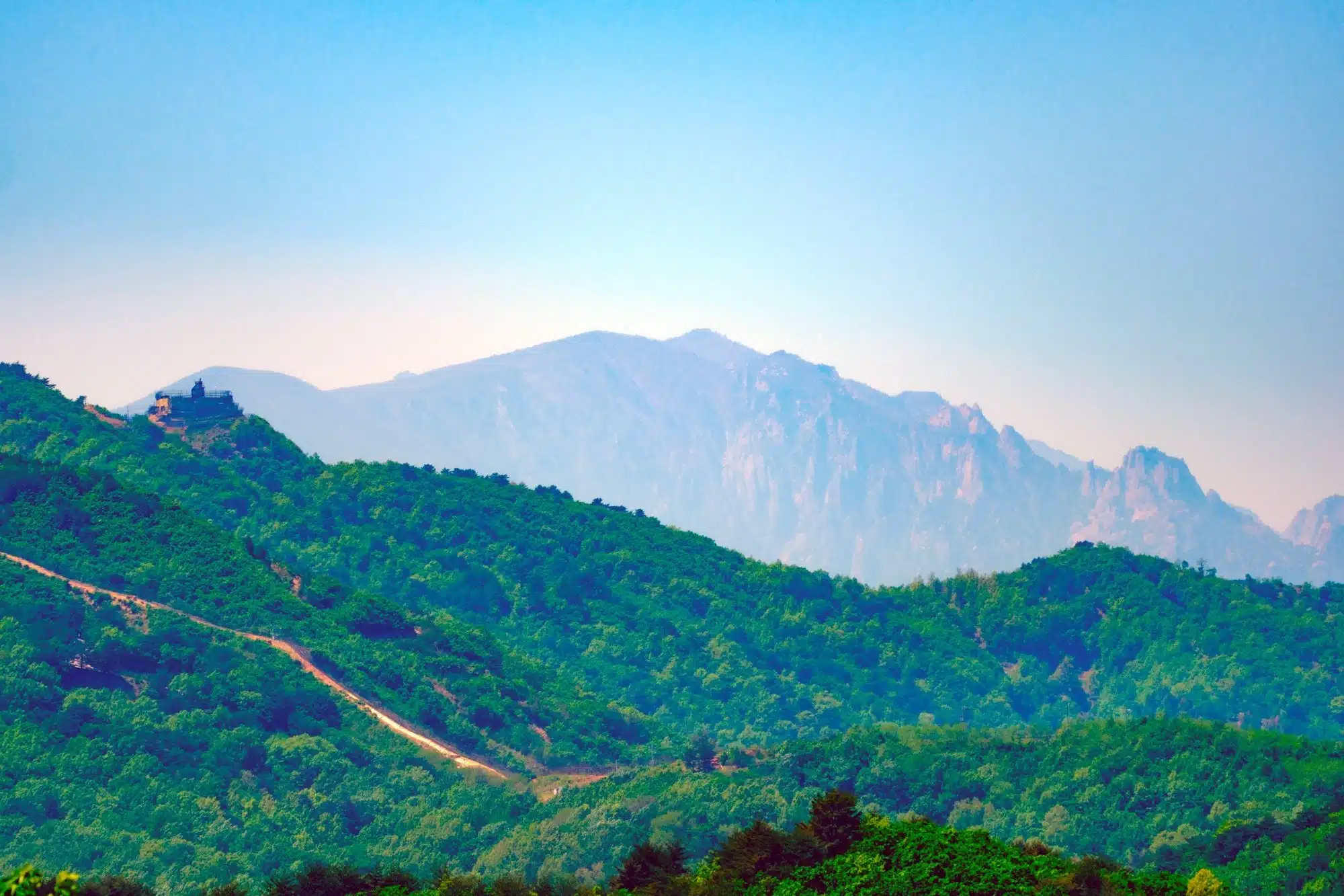 optimized_goseong Mount Kumgang, Korea's most beloved mountain located in North Korea, seen from the Goseong Observatory in the South.