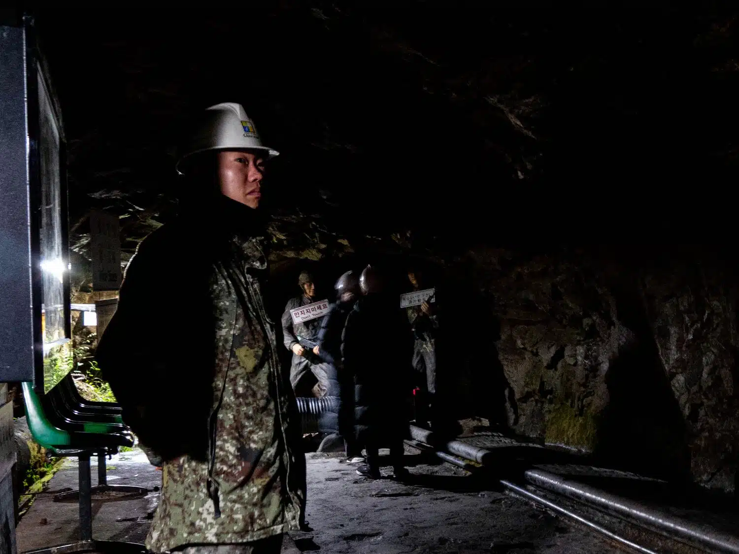 cheorwon-infiltration-tunnel-interior A South Korean soldier stands guard at the end of the “Second Infiltration Tunnel” dug by North Korea under the Demilitarized Zone near Cheorwon. This tunnel, intended to facilitate an invasion of the South, was discovered in 1975 and turned into a tourist attraction.