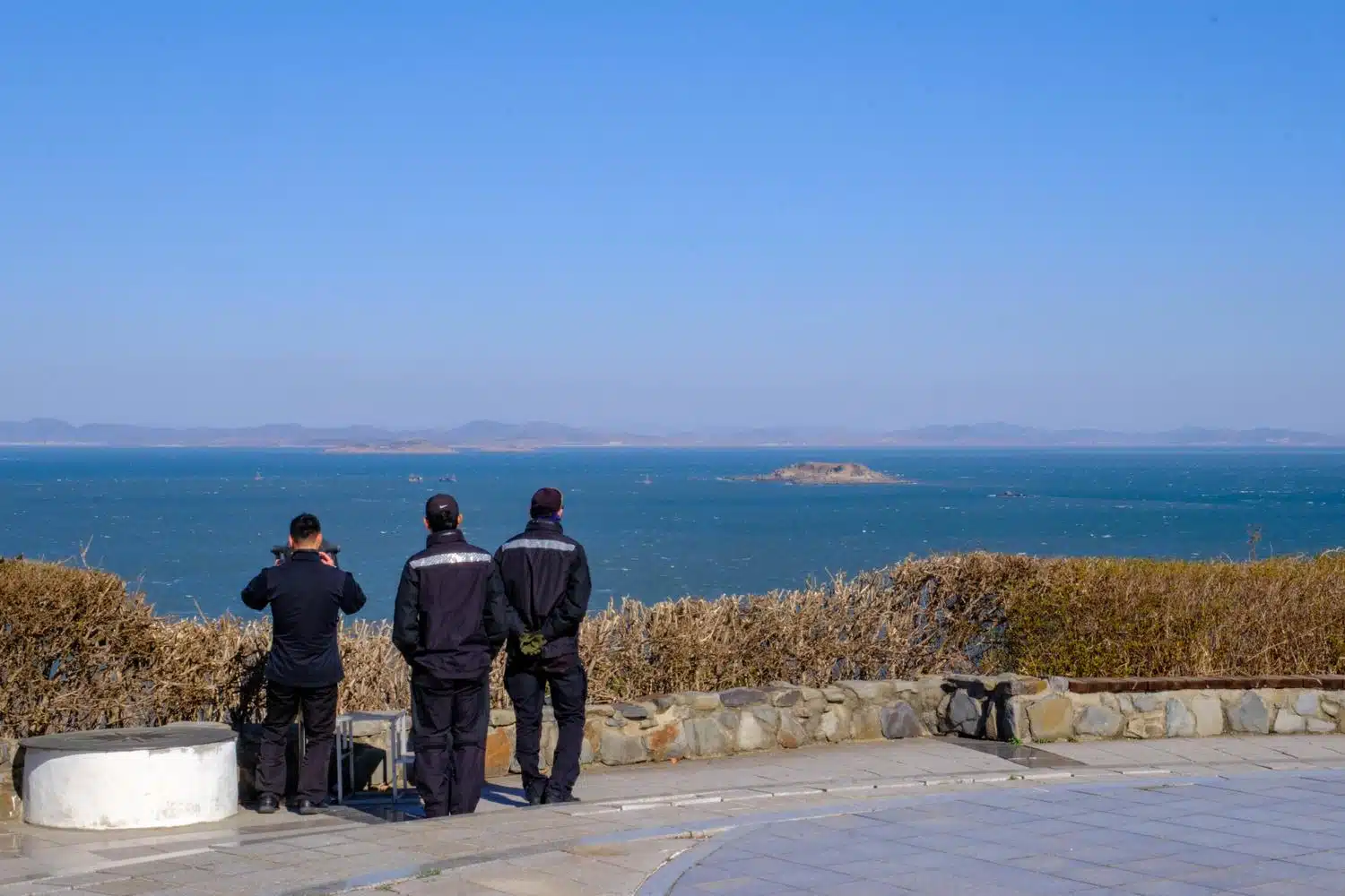 yeonpyeong-do-korea-00030 South Korean coast guard personnel on Yeonpyeong Island monitor Chinese and unidentified vessels fishing illegally around North Korean islets located a few kilometers away.